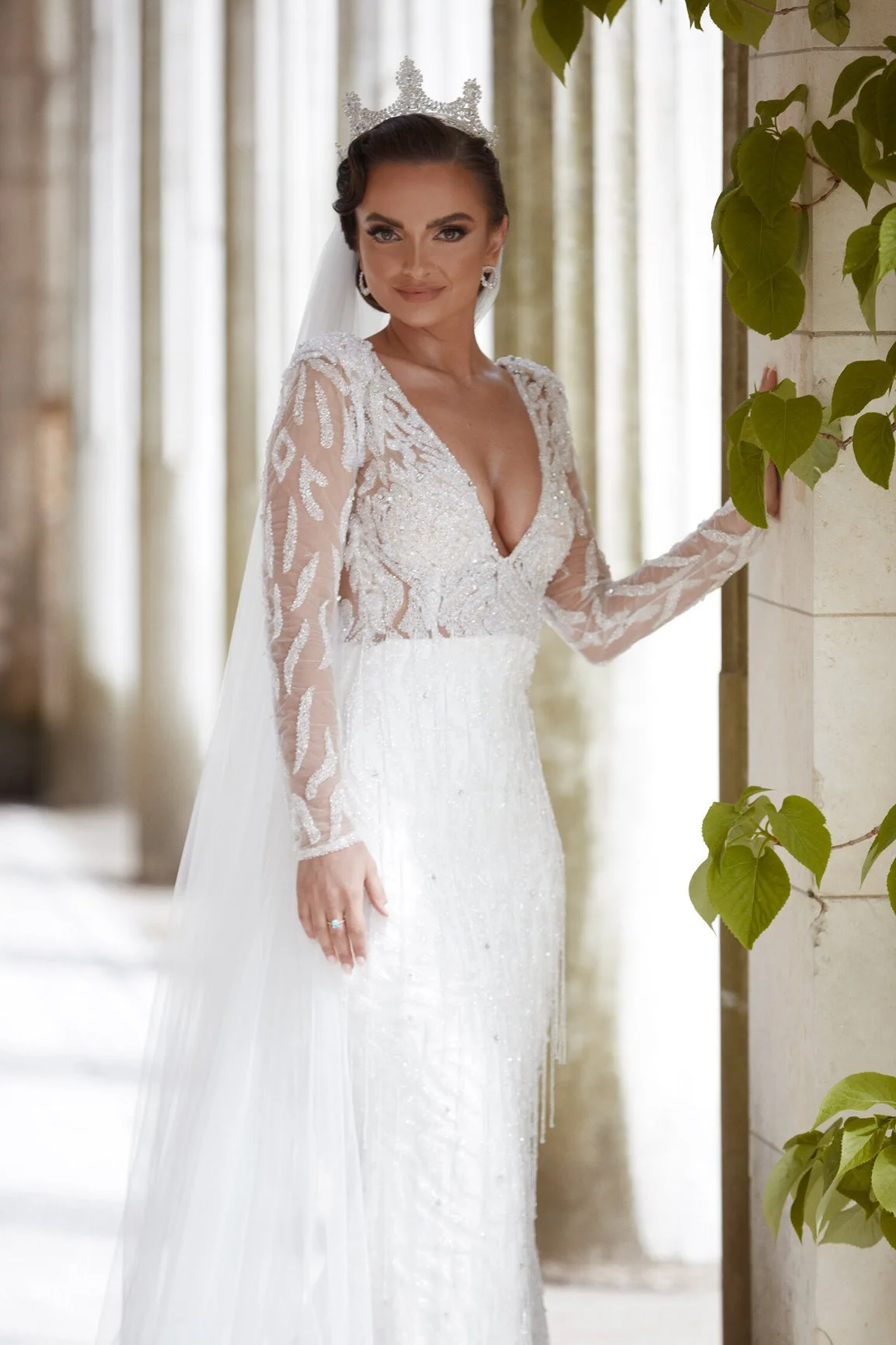 Luxury bridal hairstyling services Marrakech — bride with veil and tiara
